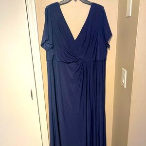 Navy blue long dress with short sleeves.